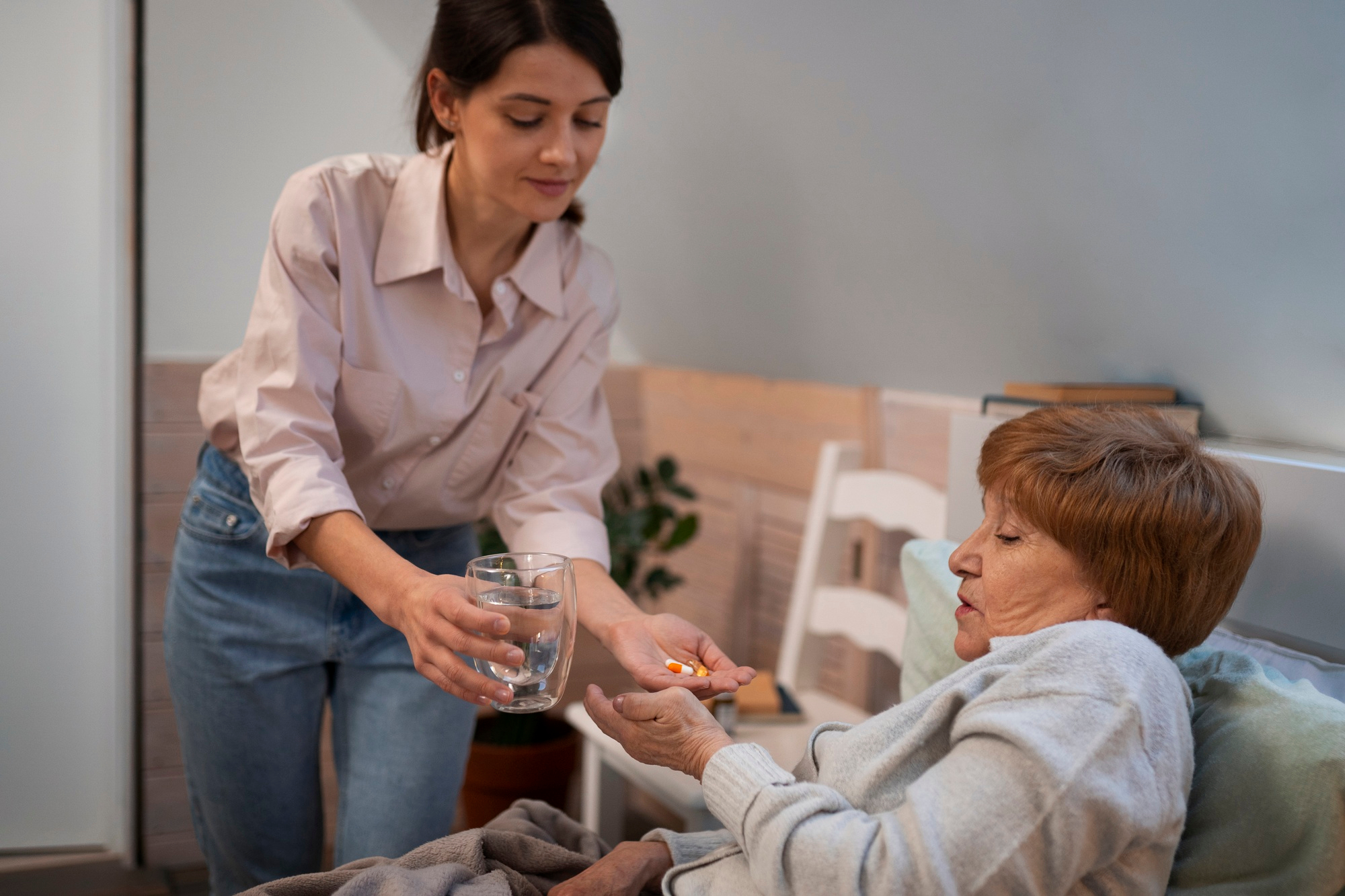 Female NDIS Support Worker Taking Care of Disabled Person